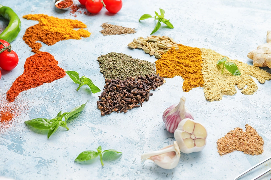 World map made of different spices on light background 